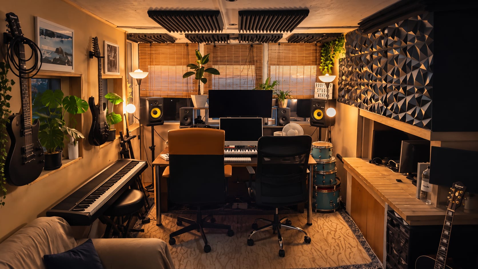 Rooftop Studio recording setup with monitors, drums and guitars